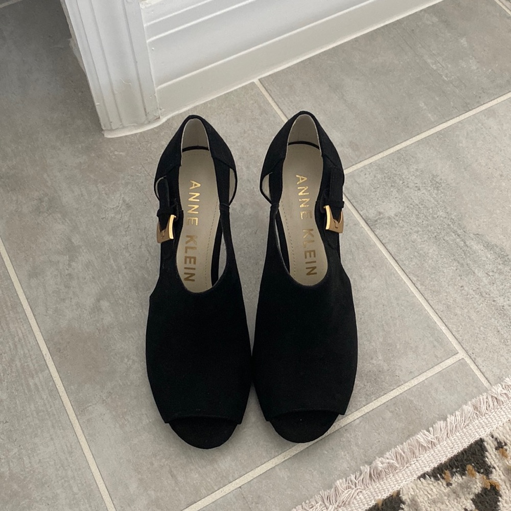 Anne Klein open toe buckle heels.